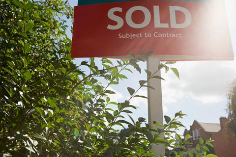 Sold sign in sunlight