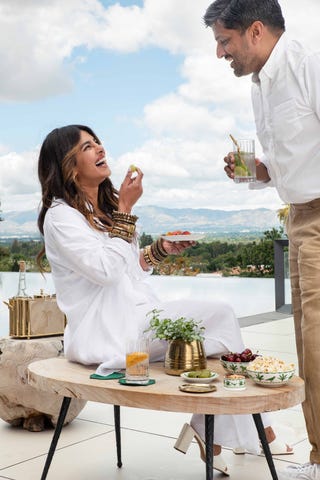 Dinner, Host, Sona, Celebrity Style priyanka chopra and sona home cofounder maneesh goyal have a laugh outside while enjoying some food