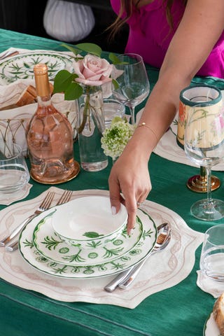 Dinner, Host, Sona, Celebrity Style a table set with green and white dishes a green table cloth and white placemats