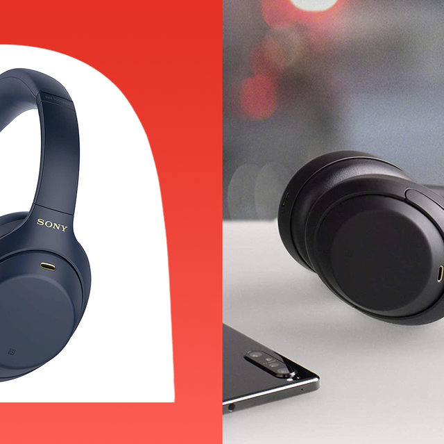 sony noise canceling headphones on table with phone and passport
