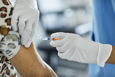 spanish hospital administers some of the country's first covid 19 vaccination shots