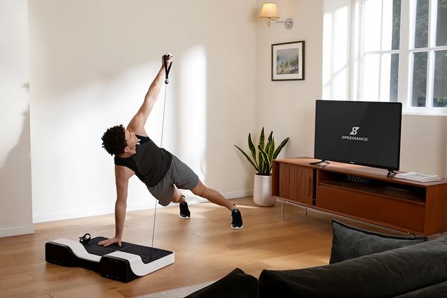a person working out in his living room