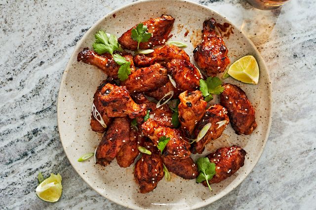 spicy apricot glazed wings served with cilantro and lime wedges