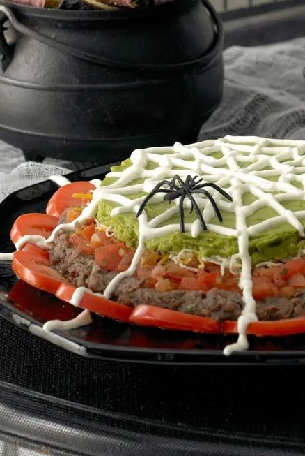 halloween food ideas spiderweb nacho spread