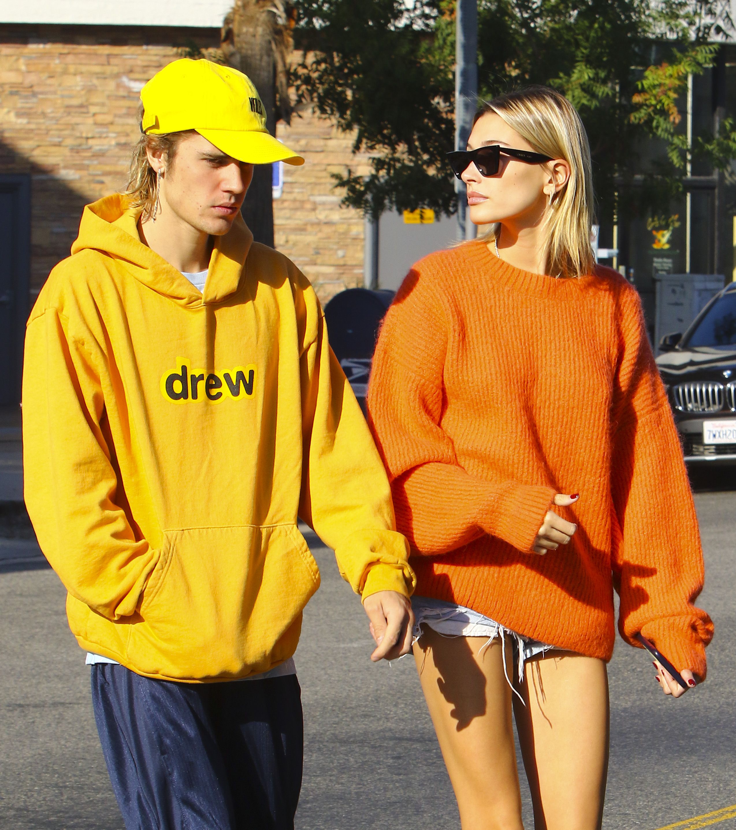 hailey baldwin orange sweater