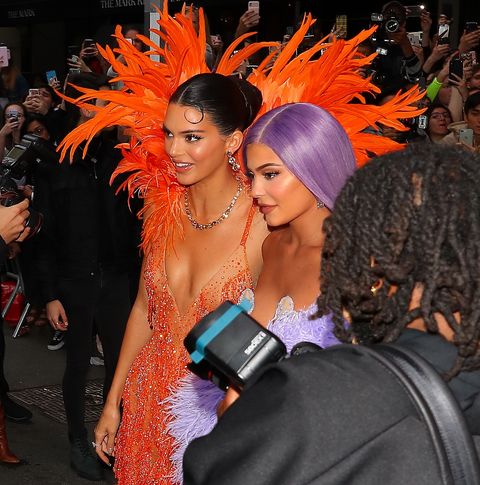 Kylie Jenner And Kendall Jenner Wear Matching Feather Gowns