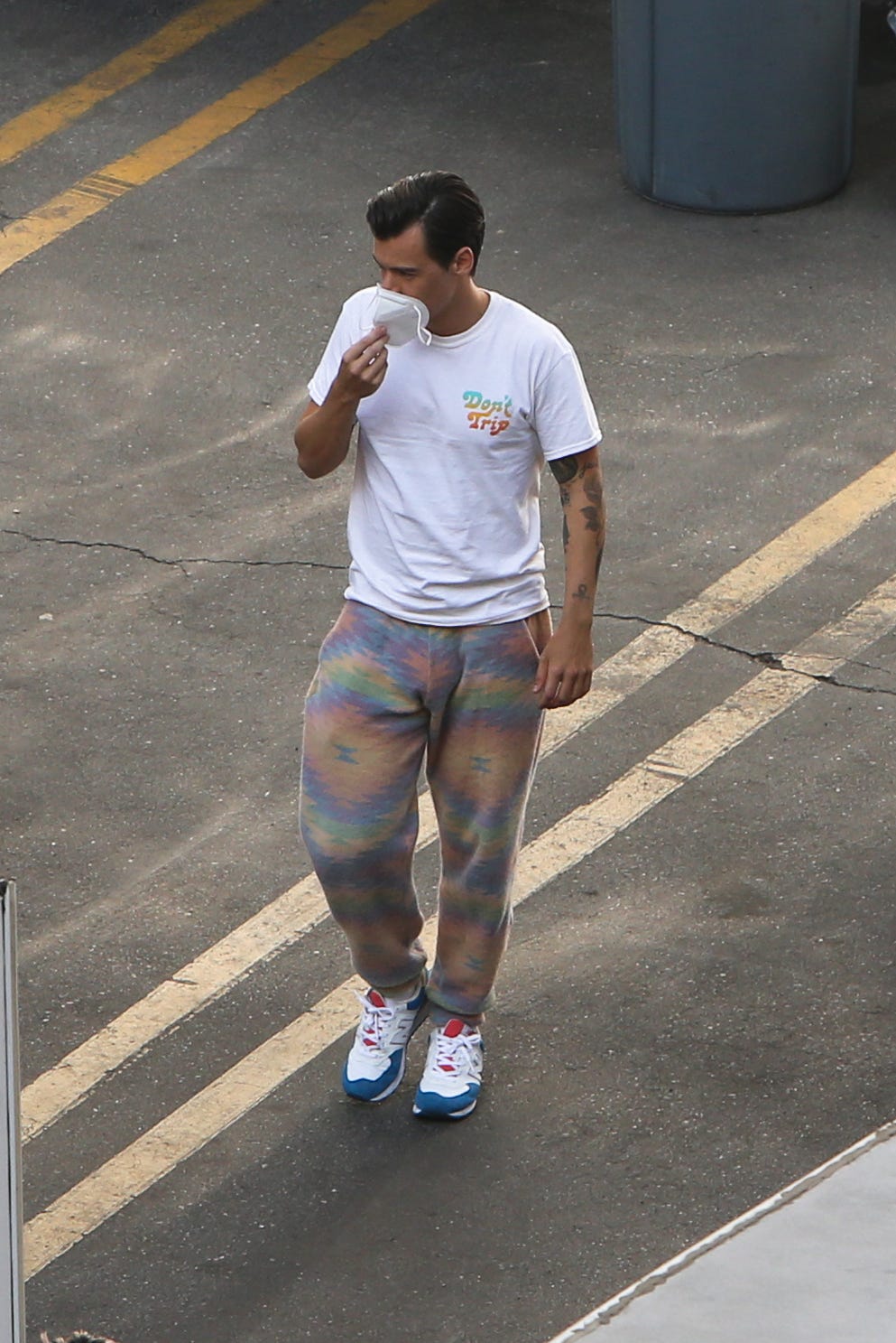 Harry Styles Debuts A New Retro Haircut And Tie Dyed Sweats