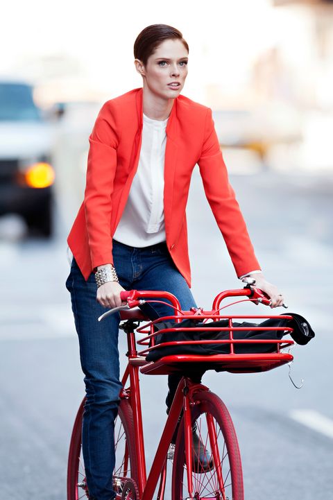 Bicycle, Bicycle part, Street fashion, Clothing, Vehicle, Bicycle wheel, Fashion, Standing, Snapshot, Outerwear, 
