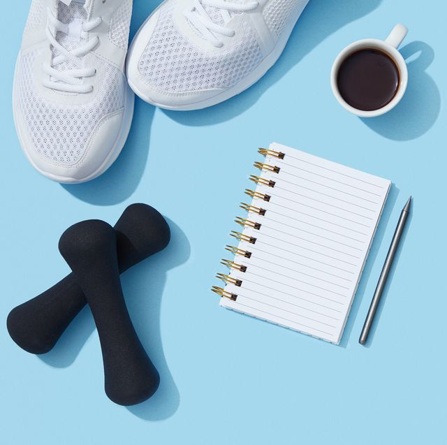 Sports equipment and accessories, shoes, dumbbells, notebook and coffee on blue background