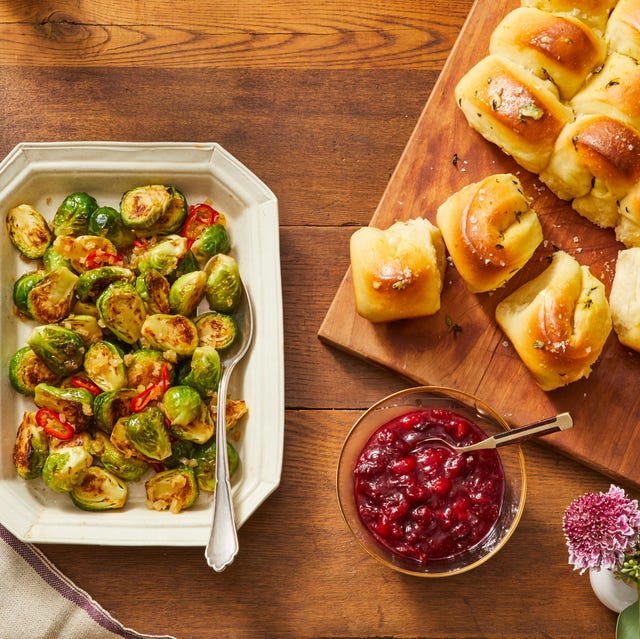 sweet and sour brussels sprouts, cranberry apple sauce, and orange thyme parker house rolls