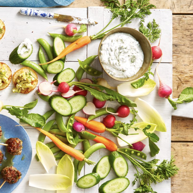 spring crudite with carrots, cucumber, radish and a white dip