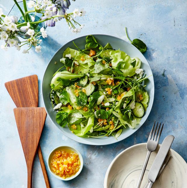 spring salad recipe with apricot vinaigrette on a blue plate