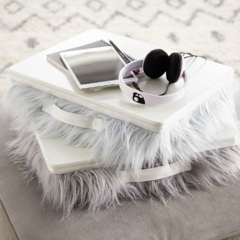 Feather, Fur, Eyelash, Fashion accessory, Table, Natural material, Ear, Silver, 