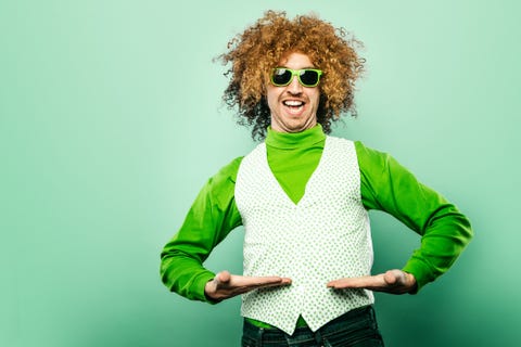 man dressed in st patricks day vest with sunglasses