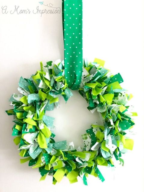 green wreath made of fabric scraps