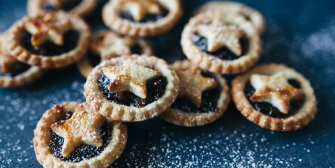 Stack of homemade mince pies with star pastry decoration