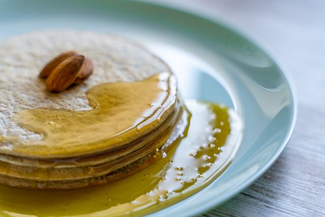 almond flour stack of pancakes with honey and almonds