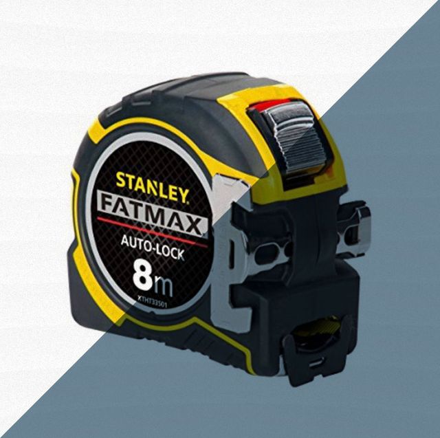 stanley metric tape measure against gray and white background