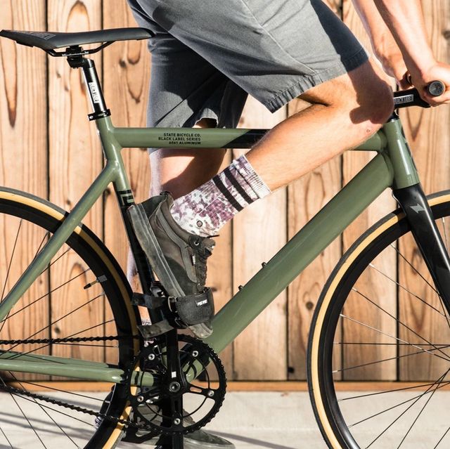 person riding state bicycle co fixed gear bike