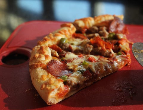 Sterling-Rice Group culinary director Cathyn Olchowy, and associate culinary director Kazia Jankowski, prepared an Annie's organic frozen pizza as they show how they utilize their Boulder office kitchen for product tastings. They were at their office on W