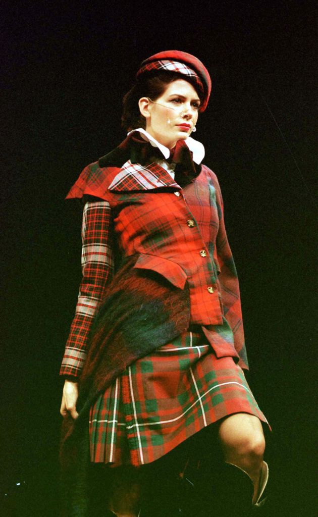 a model presents a tartan kilt and jacket creation from the vivienne westwood springsummer collection of fashion at the scottish exhibition and conference centre in glasgow, the first time that ms westwood has shown her collection on the catwalk outside london   photo by david cheskin   pa imagespa images via getty images