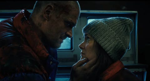 stranger things david harbour and winona ryder look at each other affectionately