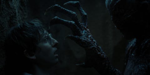 4 stranger things l to r logan riley bruner as fred benson and vecna in stranger things cr courtesy of netflix © 2022