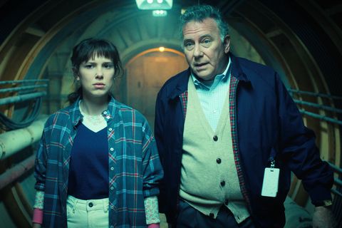 stranger things l to r millie bobby brown as eleven and paul reiser as dr owens in stranger things cr courtesy of netflix © 2022