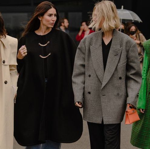 four women wearing coats to illustrate a roundup of the best coats and jackets on sale during black friday cyber monday 2021