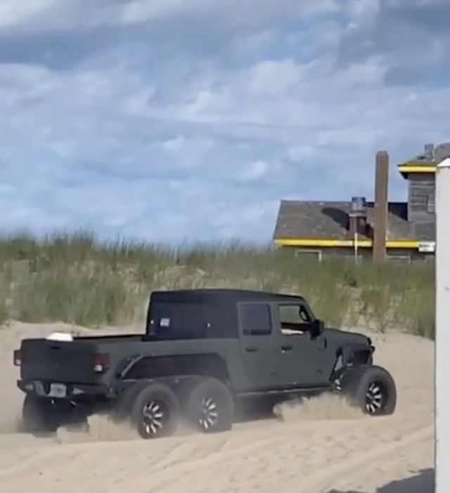 jeep gladiator 6x6 stuck on the beach in the hamptons