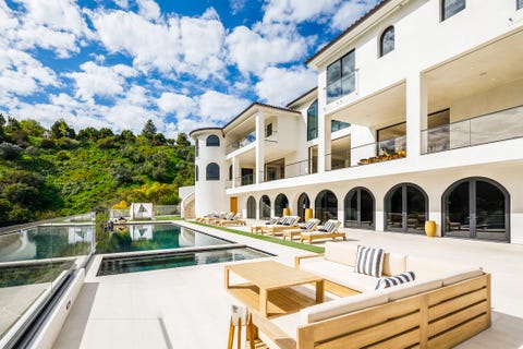 outdoor pool area with daybed