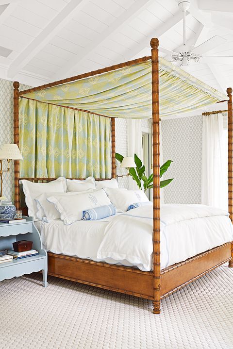 preppy bedroom with bamboo bedframe