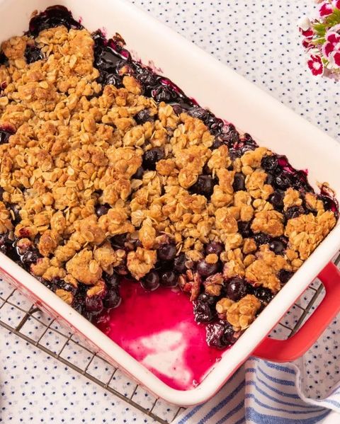 blueberry crumble in baking dish on wire rack