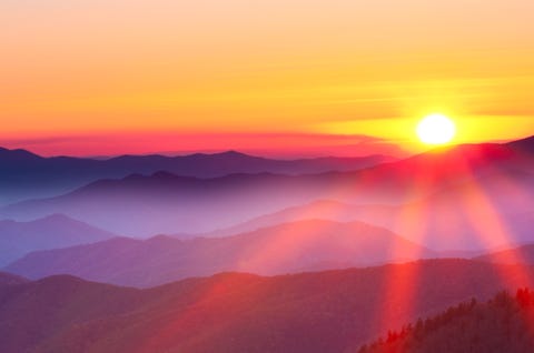 Sunset on a foggy mountain range Sunset on a foggy mountain range