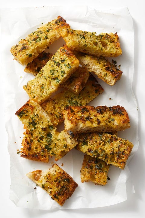 super bowl food ideas cheesy garlic bread cheesy garlic bread on parchment paper