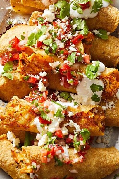 super bowl food ideas chicken taquitos chicken taquitos with pico de gallo on top
