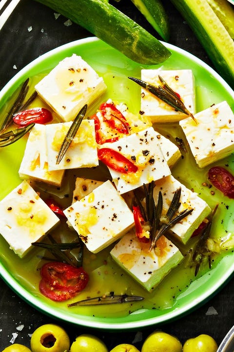 super bowl food ideas marinated feta marinated feta cheese on a plate