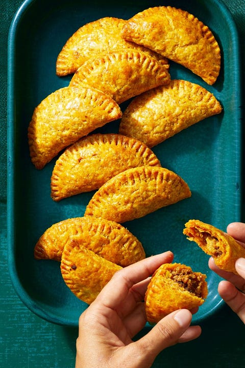 super bowl menu ideas beef empanadas beef empanadas on a blue baking pan
