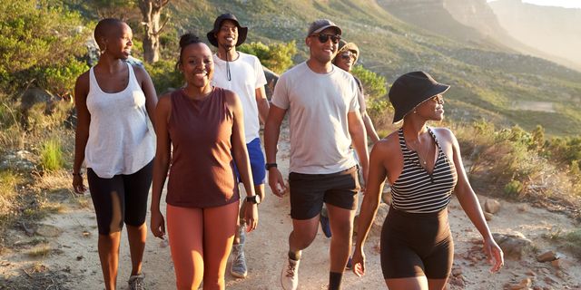group of people hiking in athletic gear