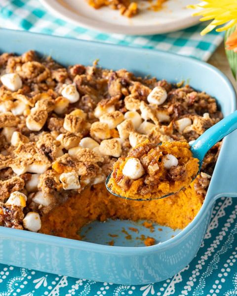 sweet potato casserole with marshmallow in blue dish