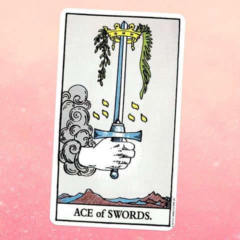 the ace of swords tarot card, showing a hand rising from the sky holding a giant sword