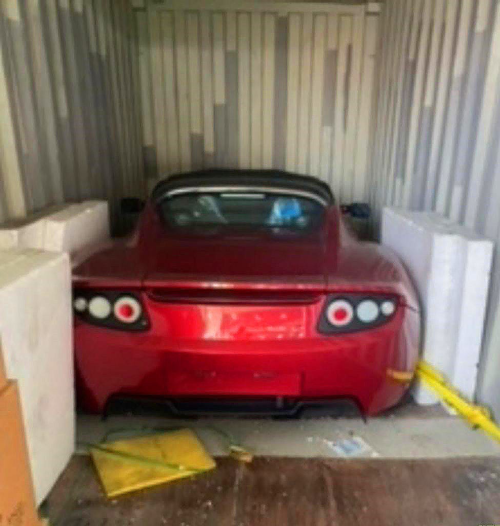 Three Brand-New, Undriven Tesla Roadsters Were Just Discovered in Shipping Containers