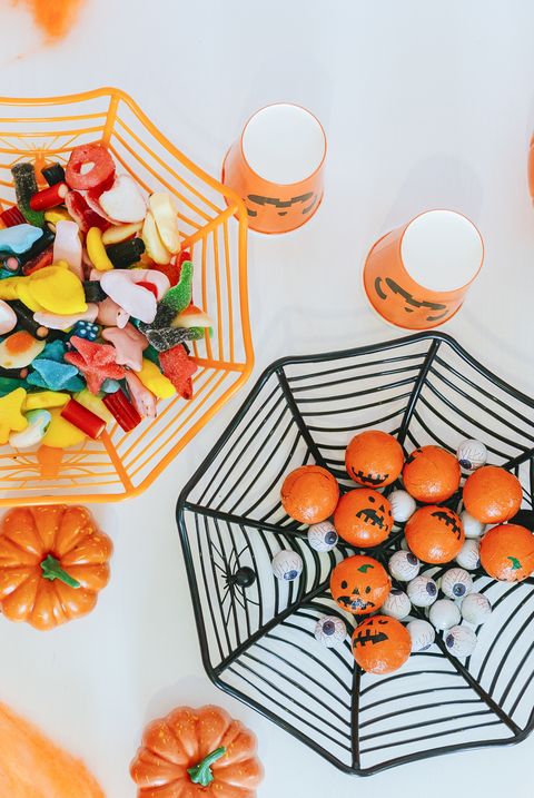 table with halloween decoration and candies