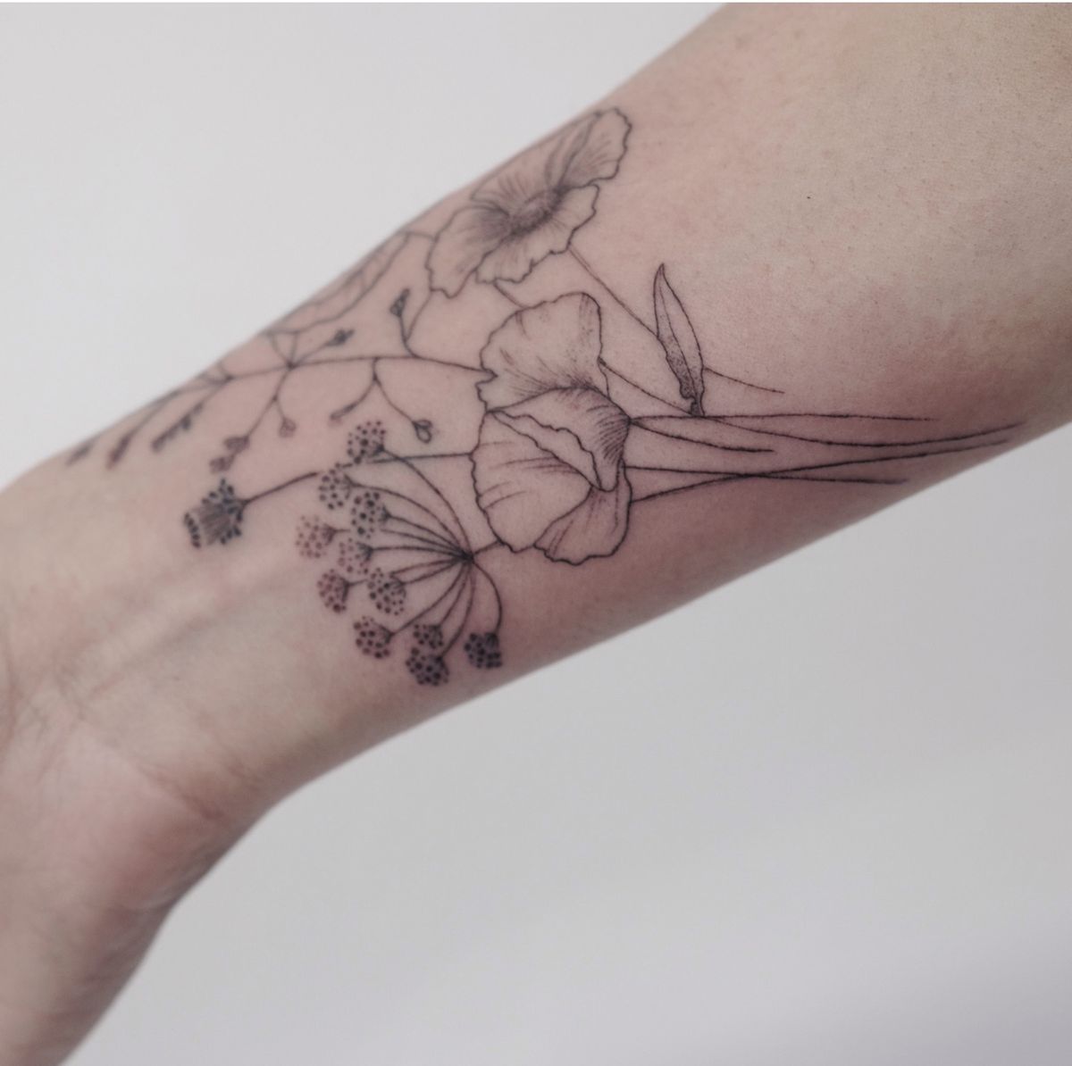 30 tatuajes de flores bonitos y originales para mujer