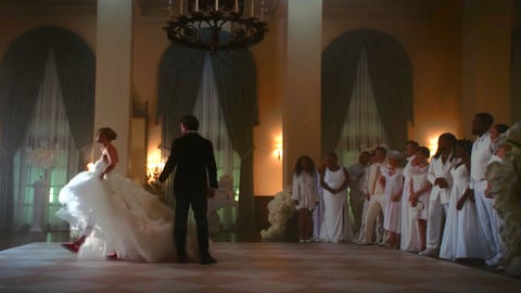 taylor walks briskly in a wedding dress and sneakers in the music video i bet you think of me