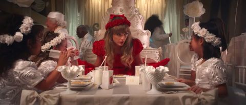 taylor swift sitting at the kids table at a wedding in the i bet you think about me music video
