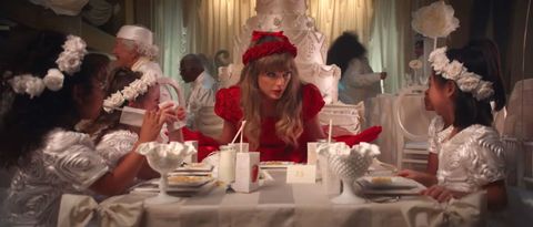 taylor swift sitting at the kids table at a wedding in the i bet you think about me music video