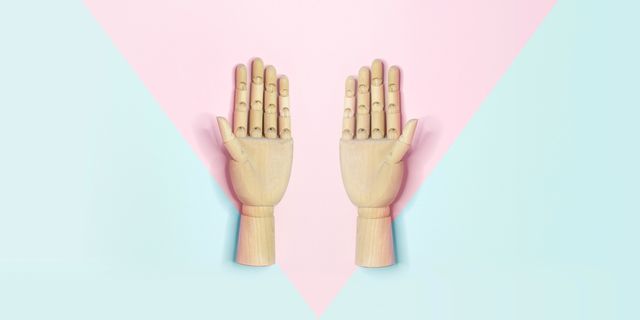 hands on a pink and blue background