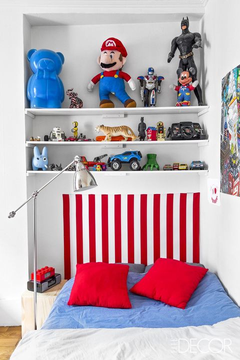 Room, Red, Bed, Furniture, Bedroom, Shelf, Fictional character, Wall, Interior design, Bed sheet, 