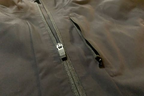 close up of the zipper on a ten thousand jacket